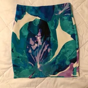 Bebe multi-color mini skirt.